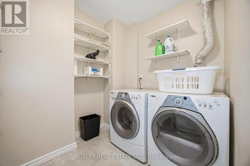 1008 - 511 The West Mall, Toronto, ON - Indoor Photo Showing Laundry Room
