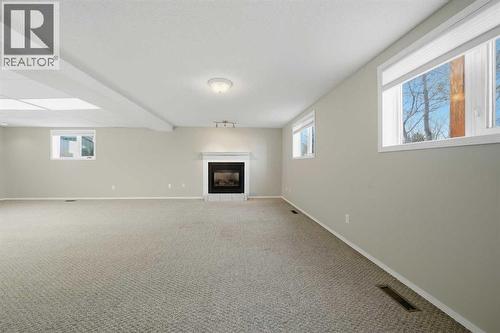 15 26534 Township Road 384, Rural Red Deer County, AB - Indoor With Fireplace