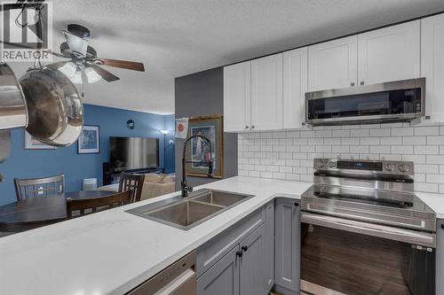 202, 1915 26 Street Sw, Calgary, AB - Indoor Photo Showing Kitchen With Double Sink With Upgraded Kitchen