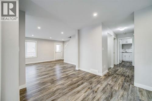 Dining Looking Towards Hallway - 203 1 Street, Shaughnessy, AB - Indoor Photo Showing Other Room