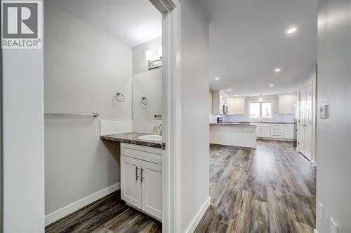 Hall with 2-Piece Bath - 203 1 Street, Shaughnessy, AB - Indoor