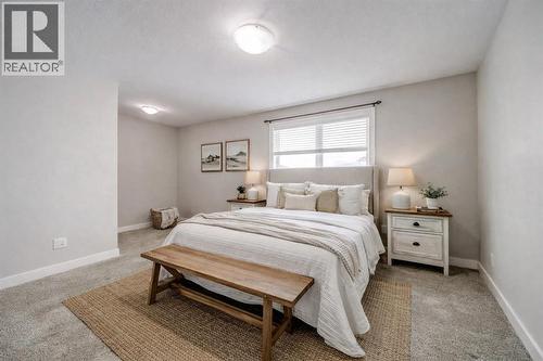 Virtually Staged - 203 1 Street, Shaughnessy, AB - Indoor Photo Showing Bedroom