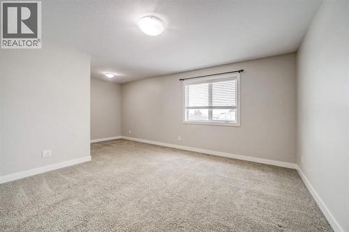 Master Bedroom - 203 1 Street, Shaughnessy, AB - Indoor Photo Showing Other Room