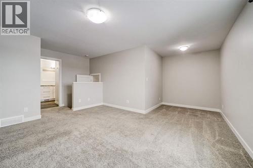 Master Bedroom - 203 1 Street, Shaughnessy, AB - Indoor Photo Showing Other Room