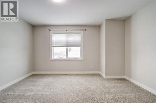 Upstairs Bedroom #2 - 203 1 Street, Shaughnessy, AB - Indoor Photo Showing Other Room