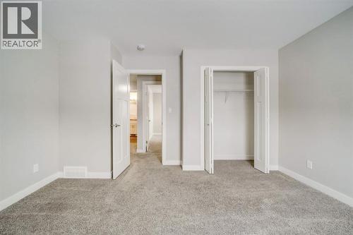 Upstairs Bedroom #2 - 203 1 Street, Shaughnessy, AB - Indoor Photo Showing Other Room