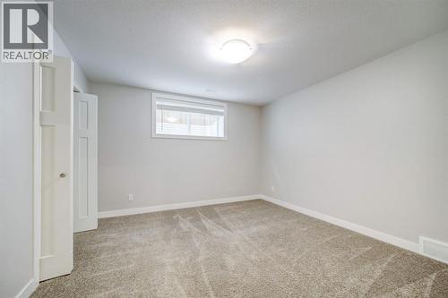Basement Bedroom #2 - 203 1 Street, Shaughnessy, AB - Indoor Photo Showing Other Room