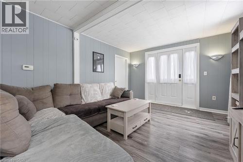 Living area featuring wood finished floors and wooden walls - 234 Head Street N, Simcoe, ON - Indoor Photo Showing Living Room