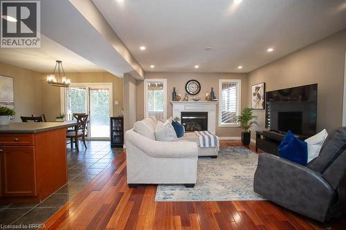 18 Gaal Court, Brantford, ON - Indoor Photo Showing Living Room With Fireplace