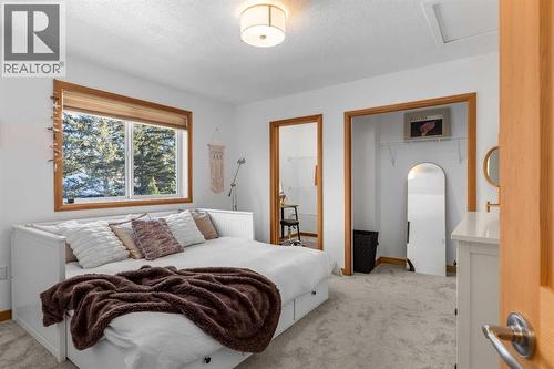 1712 11Th Avenue, Canmore, AB - Indoor Photo Showing Bedroom