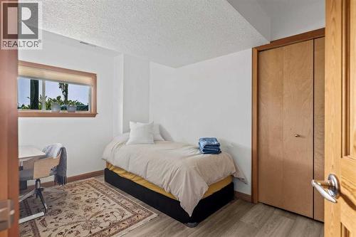 1712 11Th Avenue, Canmore, AB - Indoor Photo Showing Bedroom