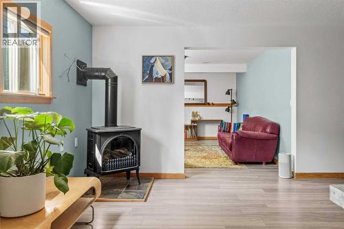 1712 11Th Avenue, Canmore, AB - Indoor With Fireplace