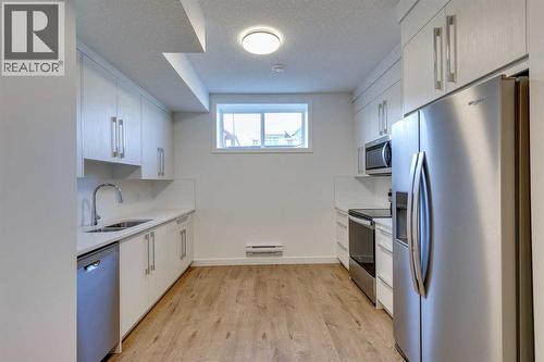 646 Rangeview Street Se, Calgary, AB - Indoor Photo Showing Kitchen With Stainless Steel Kitchen With Double Sink