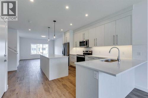 646 Rangeview Street Se, Calgary, AB - Indoor Photo Showing Kitchen With Stainless Steel Kitchen With Double Sink With Upgraded Kitchen