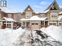 View of front of house with a porch and brick siding - 29 Amsterdam Crescent, Guelph, ON  - Outdoor With Facade 