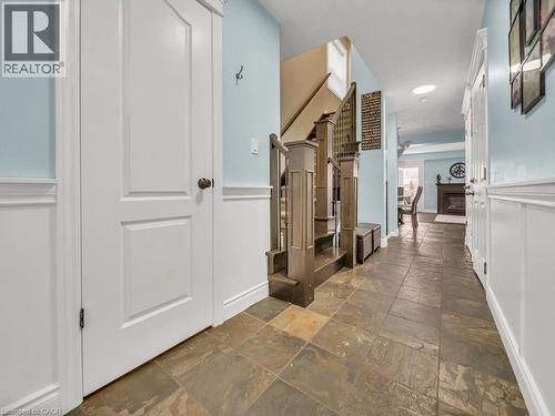 Hallway featuring baseboards and stone tile floors - 29 Amsterdam Crescent, Guelph, ON - Indoor Photo Showing Other Room