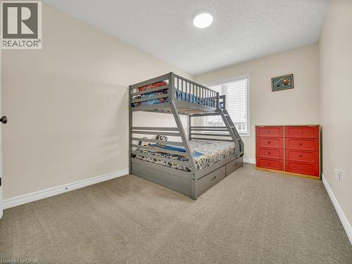 Bedroom featuring carpet and a textured ceiling - 29 Amsterdam Crescent, Guelph, ON - Indoor Photo Showing Bedroom