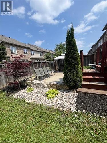Fenced backyard with a deck, a patio, and a gazebo - 29 Amsterdam Crescent, Guelph, ON - Outdoor
