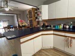 View from kitchen to dining area. - 