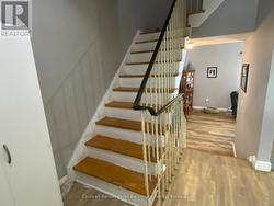 Stairs to upper level. - 