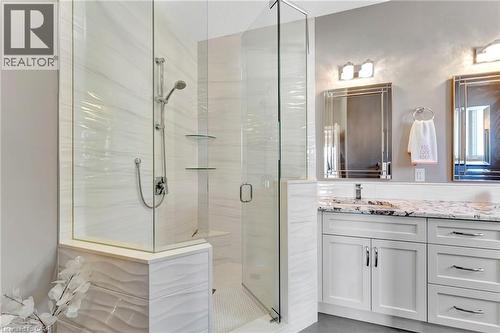 Full bath with vanity and a stall shower - 107 Forbes Crescent, Listowel, ON - Indoor Photo Showing Bathroom
