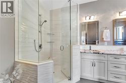 Full bath with vanity and a stall shower - 