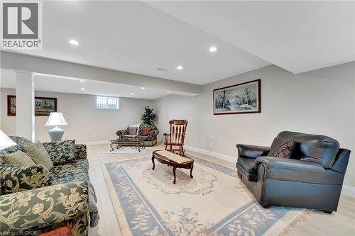 Living area with recessed lighting and light wood-style floors - 107 Forbes Crescent, Listowel, ON - Indoor