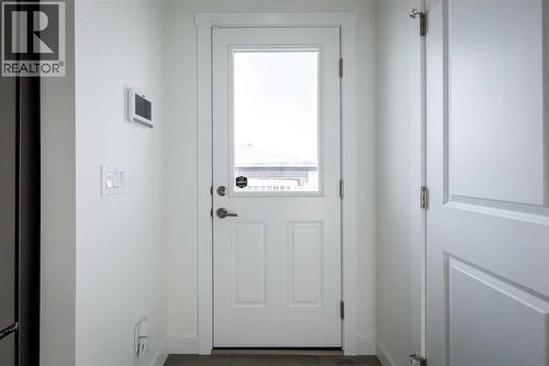 67 Appaloosa Way, Cochrane, AB - Indoor Photo Showing Other Room