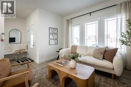 67 Appaloosa Way, Cochrane, AB - Indoor Photo Showing Living Room
