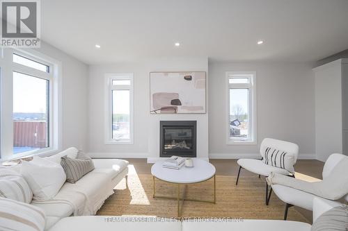 Lot 17 - 71 Dearing Drive, South Huron (Stephen), ON - Indoor Photo Showing Living Room With Fireplace