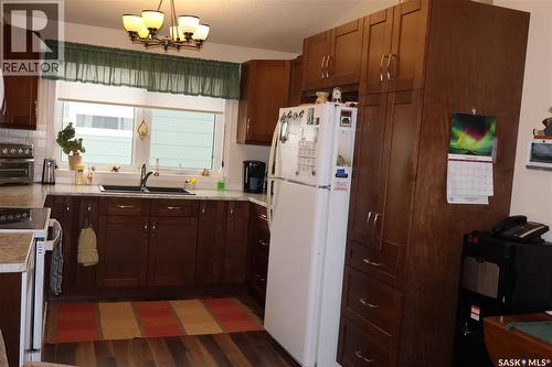 604 5Th Avenue W, Assiniboia, SK - Indoor Photo Showing Kitchen With Double Sink