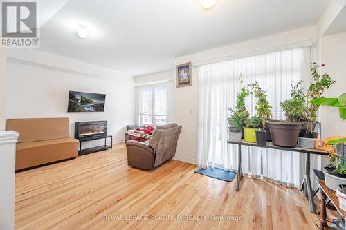 20 Haymarket Drive, Brampton, ON - Indoor Photo Showing Living Room With Fireplace