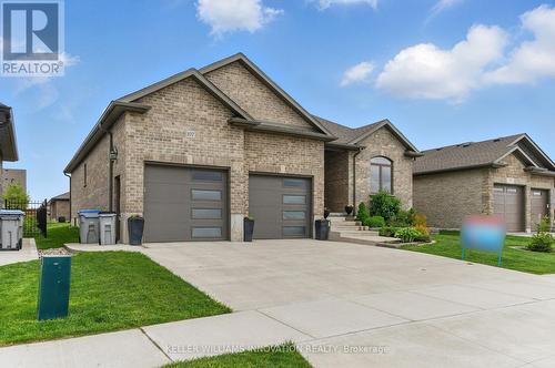 107 Forbes Crescent, North Perth, ON - Outdoor With Facade