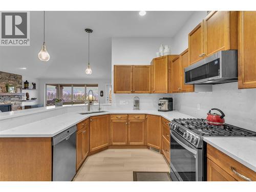 New Quartz Counters - 2455 Quail Ridge Boulevard Unit# 213, Kelowna, BC - Indoor Photo Showing Kitchen