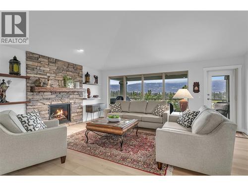 Live with Amazing View - 2455 Quail Ridge Boulevard Unit# 213, Kelowna, BC - Indoor Photo Showing Living Room With Fireplace