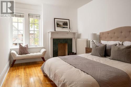 7 Binscarth Road, Toronto, ON - Indoor Photo Showing Bedroom With Fireplace