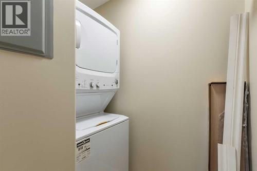 4104, 10 Prestwick Bay Se, Calgary, AB - Indoor Photo Showing Laundry Room