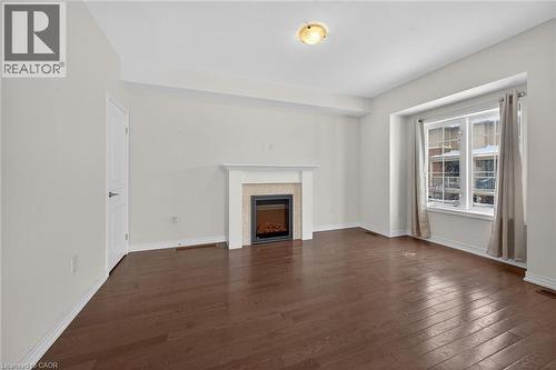 515 Winston Road Unit# 22, Grimsby, ON - Indoor Photo Showing Living Room With Fireplace