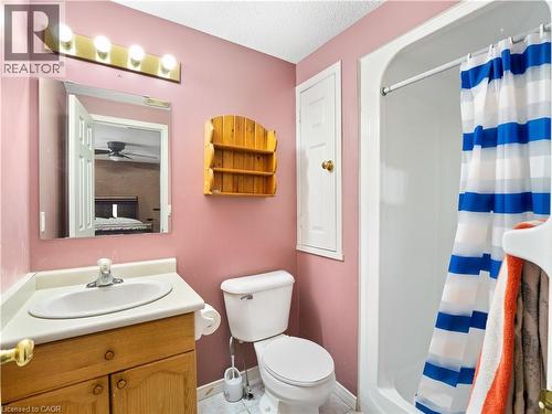 Bathroom featuring a stall shower, vanity, and a textured ceiling - 47 Schroder Crescent, Guelph, ON - Indoor Photo Showing Bathroom