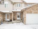 Snow covered property entrance featuring a garage - 47 Schroder Crescent, Guelph, ON  - Outdoor 