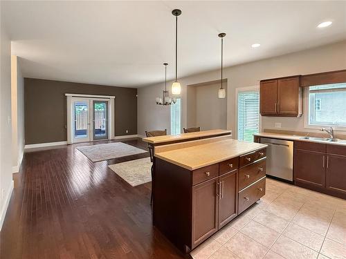 12 Augusta Crescent, Brandon, MB - Indoor Photo Showing Kitchen With Double Sink