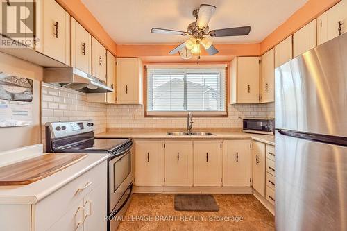D - 279 Stanley Street, Brantford, ON - Indoor Photo Showing Kitchen With Double Sink