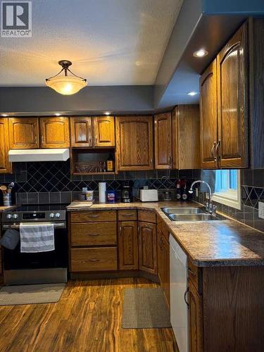 100 Balaclava Street, Veteran, AB - Indoor Photo Showing Kitchen With Double Sink