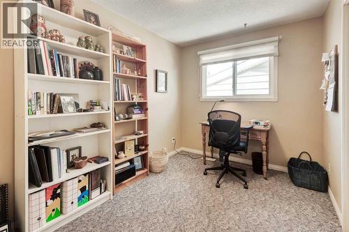 9 Mountain Place, Okotoks, AB - Indoor Photo Showing Office