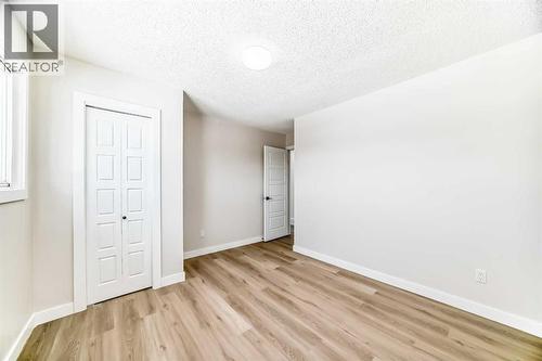 6128 Madigan Drive Ne, Calgary, AB - Indoor Photo Showing Other Room