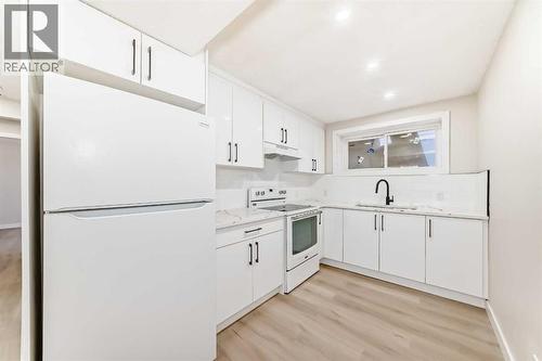 6128 Madigan Drive Ne, Calgary, AB - Indoor Photo Showing Kitchen