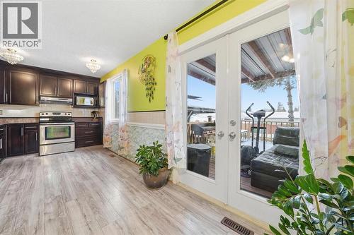6411 26 Avenue Ne, Calgary, AB - Indoor Photo Showing Kitchen With Stainless Steel Kitchen