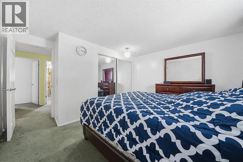 6411 26 Avenue Ne, Calgary, AB - Indoor Photo Showing Bedroom