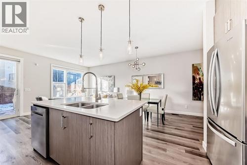267 Sage Bluff Rise Nw, Calgary, AB - Indoor Photo Showing Kitchen With Double Sink With Upgraded Kitchen