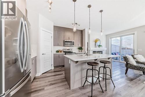 267 Sage Bluff Rise Nw, Calgary, AB - Indoor Photo Showing Kitchen With Double Sink With Upgraded Kitchen